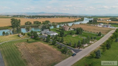 Waterfront!  Nestled along the serene banks of the iconic Snake on Journeys End Golf Course in Idaho - for sale on GolfHomes.com, golf home, golf lot