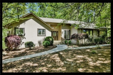 Welcome to this charmingly updated home nestled in the on Keowee Key Golf and Country Club in South Carolina - for sale on GolfHomes.com, golf home, golf lot