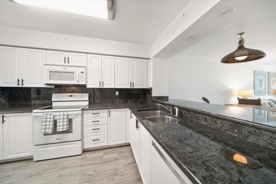 Under contract-accepting backup offers. WATERFRONT LIVING WITH on Isla Del Sol Yacht and Country Club in Florida - for sale on GolfHomes.com, golf home, golf lot