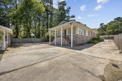 Welcome to a rare find in a quiet, non-HOA neighborhood less on Whispering Pines in South Carolina - for sale on GolfHomes.com, golf home, golf lot