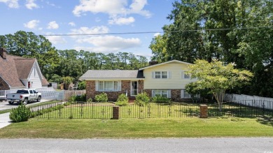Welcome to a rare find in a quiet, non-HOA neighborhood less on Whispering Pines in South Carolina - for sale on GolfHomes.com, golf home, golf lot