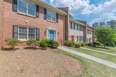 Welcome to this beautifully maintained all-brick townhome that on Dunwoody Country Club in Georgia - for sale on GolfHomes.com, golf home, golf lot