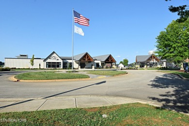 Located in the gated community of Tennessee National, this on Tennessee National Golf Club in Tennessee - for sale on GolfHomes.com, golf home, golf lot