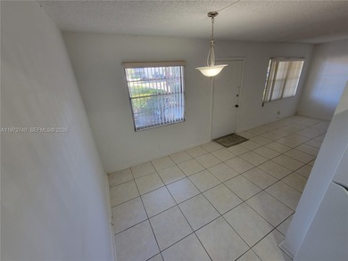 An inviting and well maintained condo in Century Village's 55+ on Flamingo Lakes Country Club in Florida - for sale on GolfHomes.com, golf home, golf lot