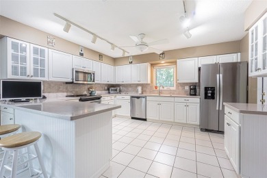 Perfect 1,430 square foot home on a gorgeous conservation lot in on Tampa Bay Golf and Country Club in Florida - for sale on GolfHomes.com, golf home, golf lot