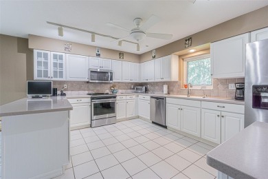 Perfect 1,430 square foot home on a gorgeous conservation lot in on Tampa Bay Golf and Country Club in Florida - for sale on GolfHomes.com, golf home, golf lot