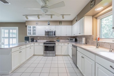 Perfect 1,430 square foot home on a gorgeous conservation lot in on Tampa Bay Golf and Country Club in Florida - for sale on GolfHomes.com, golf home, golf lot
