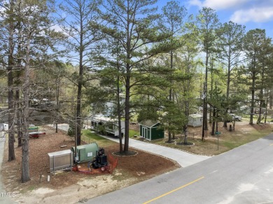Introducing your new slice of paradise! Welcome to the on River Golf and County Club at Lake Royale in North Carolina - for sale on GolfHomes.com, golf home, golf lot