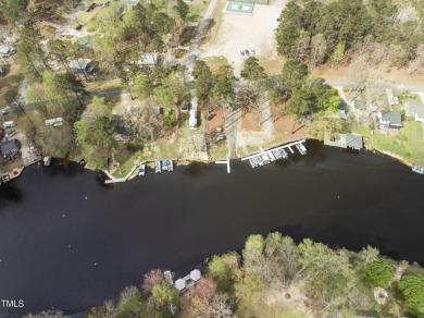 Introducing your new slice of paradise! Welcome to the on River Golf and County Club at Lake Royale in North Carolina - for sale on GolfHomes.com, golf home, golf lot