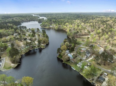 Introducing your new slice of paradise! Welcome to the on River Golf and County Club at Lake Royale in North Carolina - for sale on GolfHomes.com, golf home, golf lot
