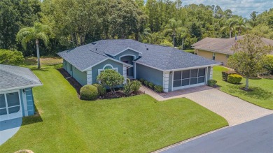 Perfect 1,430 square foot home on a gorgeous conservation lot in on Tampa Bay Golf and Country Club in Florida - for sale on GolfHomes.com, golf home, golf lot