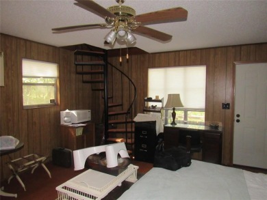 GOLF CART IN GARAGE AND BOAT SLIP IN PRIVATE BOATHOUSE WITH on Tanglewood Resort in Texas - for sale on GolfHomes.com, golf home, golf lot