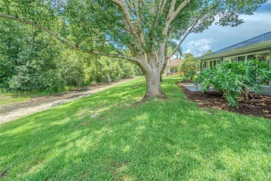 Perfect 1,430 square foot home on a gorgeous conservation lot in on Tampa Bay Golf and Country Club in Florida - for sale on GolfHomes.com, golf home, golf lot
