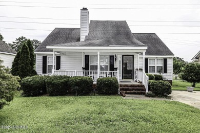 This 3 bedroom 2 bath home offers beautiful wood flooring on Northgreen Country Club in North Carolina - for sale on GolfHomes.com, golf home, golf lot