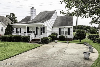 This 3 bedroom 2 bath home offers beautiful wood flooring on Northgreen Country Club in North Carolina - for sale on GolfHomes.com, golf home, golf lot