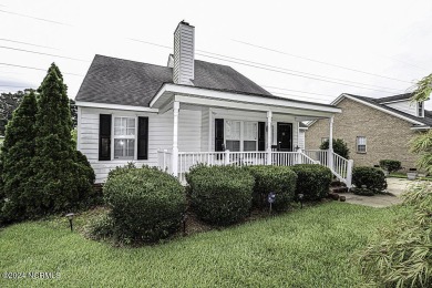 This 3 bedroom 2 bath home offers beautiful wood flooring on Northgreen Country Club in North Carolina - for sale on GolfHomes.com, golf home, golf lot