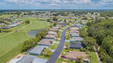 Perfect 1,430 square foot home on a gorgeous conservation lot in on Tampa Bay Golf and Country Club in Florida - for sale on GolfHomes.com, golf home, golf lot