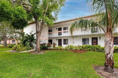 Stunning Waterview Condo in the Gated Community of East Lake on East Lake Woodlands Country Club in Florida - for sale on GolfHomes.com, golf home, golf lot