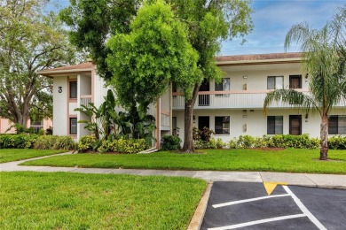 Stunning Waterview Condo in the Gated Community of East Lake on East Lake Woodlands Country Club in Florida - for sale on GolfHomes.com, golf home, golf lot