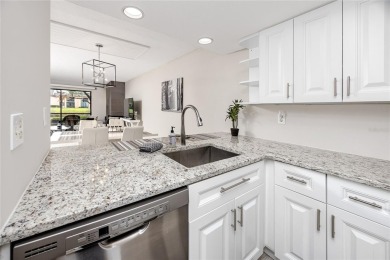 Stunning Waterview Condo in the Gated Community of East Lake on East Lake Woodlands Country Club in Florida - for sale on GolfHomes.com, golf home, golf lot