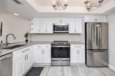 Stunning Waterview Condo in the Gated Community of East Lake on East Lake Woodlands Country Club in Florida - for sale on GolfHomes.com, golf home, golf lot