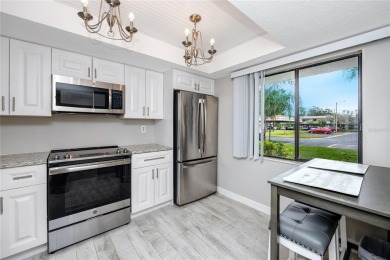 Stunning Waterview Condo in the Gated Community of East Lake on East Lake Woodlands Country Club in Florida - for sale on GolfHomes.com, golf home, golf lot