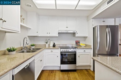Incredible new price on this bright, inviting and beautifully on Rossmoor Golf Course in California - for sale on GolfHomes.com, golf home, golf lot