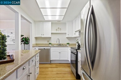 Incredible new price on this bright, inviting and beautifully on Rossmoor Golf Course in California - for sale on GolfHomes.com, golf home, golf lot