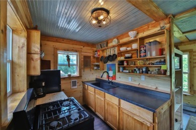 Enjoy the best of the Northwoods with this newly constructed on Hardwoods Golf Club At Mille Lacs in Minnesota - for sale on GolfHomes.com, golf home, golf lot