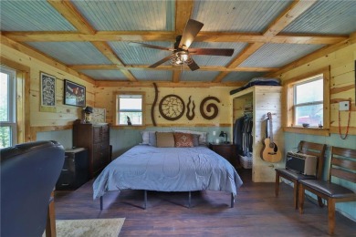 Enjoy the best of the Northwoods with this newly constructed on Hardwoods Golf Club At Mille Lacs in Minnesota - for sale on GolfHomes.com, golf home, golf lot