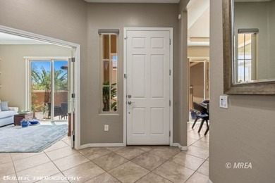 Set on nearly a quarter-acre premium golf course lot within Sun on Conestoga Golf Club in Nevada - for sale on GolfHomes.com, golf home, golf lot