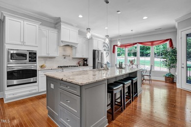 Welcome to an exceptional custom home nestled on nearly an acre on Chapel Ridge Golf Club in North Carolina - for sale on GolfHomes.com, golf home, golf lot