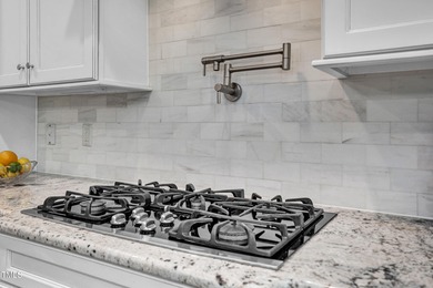 Welcome to an exceptional custom home nestled on nearly an acre on Chapel Ridge Golf Club in North Carolina - for sale on GolfHomes.com, golf home, golf lot