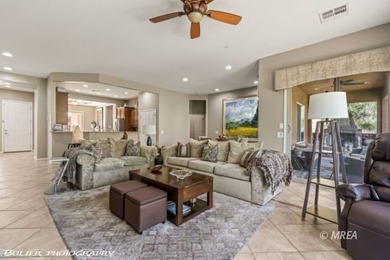 Set on nearly a quarter-acre premium golf course lot within Sun on Conestoga Golf Club in Nevada - for sale on GolfHomes.com, golf home, golf lot