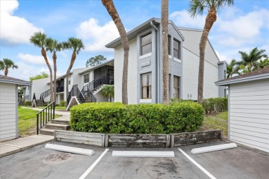 This second floor corner unit is in a gated community on Feather Sound Country Club in Florida - for sale on GolfHomes.com, golf home, golf lot