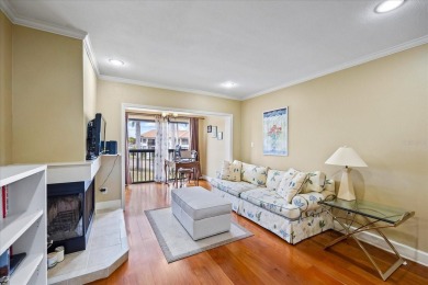 This second floor corner unit is in a gated community on Feather Sound Country Club in Florida - for sale on GolfHomes.com, golf home, golf lot
