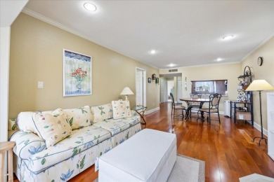 This second floor corner unit is in a gated community on Feather Sound Country Club in Florida - for sale on GolfHomes.com, golf home, golf lot