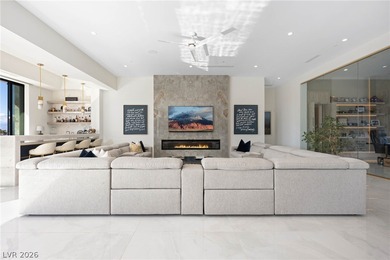 Elevated modern luxury crowns prestigious MacDonald Highlands on Dragon Ridge Country Club in Nevada - for sale on GolfHomes.com, golf home, golf lot