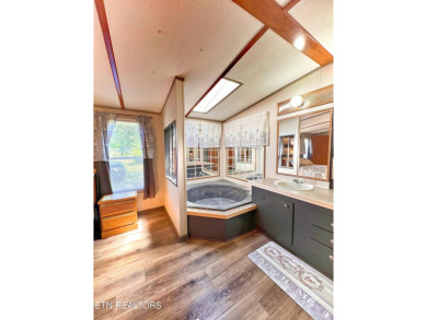 Welcome to your country home! Situated in a gorgeous valley on on Woodlake Golf Club in Tennessee - for sale on GolfHomes.com, golf home, golf lot