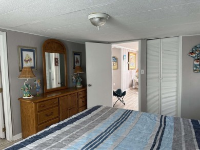 Bright  cheery 2BR/1BA beach cottage, 2024 ROOF  HVAC. Located on Prestwick Country Club in South Carolina - for sale on GolfHomes.com, golf home, golf lot