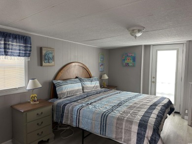 Bright  cheery 2BR/1BA beach cottage, 2024 ROOF  HVAC. Located on Prestwick Country Club in South Carolina - for sale on GolfHomes.com, golf home, golf lot