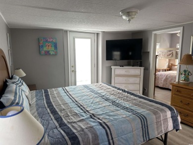 Bright  cheery 2BR/1BA beach cottage, 2024 ROOF  HVAC. Located on Prestwick Country Club in South Carolina - for sale on GolfHomes.com, golf home, golf lot