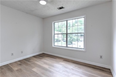 PRIME LOCATION! Beautiful traditional-style single-family home on TPC At Sugarloaf Golf Club in Georgia - for sale on GolfHomes.com, golf home, golf lot