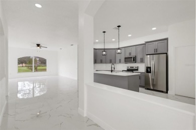 One or more photo(s) has been virtually staged. A spacious on Lexington Oaks Golf Club in Florida - for sale on GolfHomes.com, golf home, golf lot