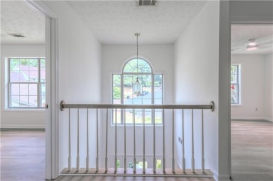 PRIME LOCATION! Beautiful traditional-style single-family home on TPC At Sugarloaf Golf Club in Georgia - for sale on GolfHomes.com, golf home, golf lot