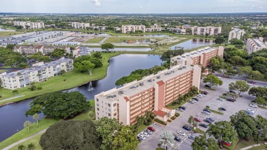Spectacular lake views abound in this waterfront condominium on Marina Lakes Golf Course in Florida - for sale on GolfHomes.com, golf home, golf lot