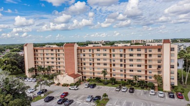 Spectacular lake views abound in this waterfront condominium on Marina Lakes Golf Course in Florida - for sale on GolfHomes.com, golf home, golf lot