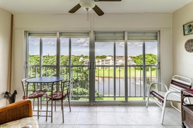 Spectacular lake views abound in this waterfront condominium on Marina Lakes Golf Course in Florida - for sale on GolfHomes.com, golf home, golf lot