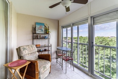 Spectacular lake views abound in this waterfront condominium on Marina Lakes Golf Course in Florida - for sale on GolfHomes.com, golf home, golf lot