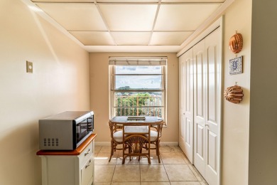 Spectacular lake views abound in this waterfront condominium on Marina Lakes Golf Course in Florida - for sale on GolfHomes.com, golf home, golf lot